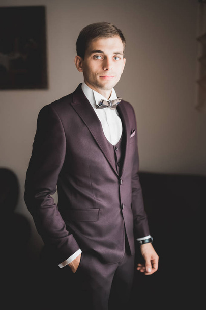 Beautiful man, groom posing and preparing for wedding - Fotoğraf, Görsel