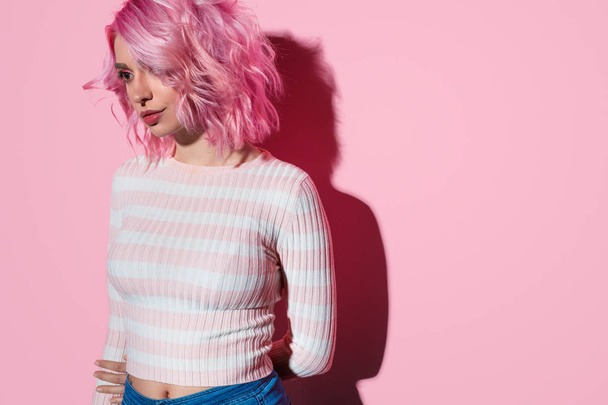 Sensual modern woman with pink hairstyle - 写真・画像