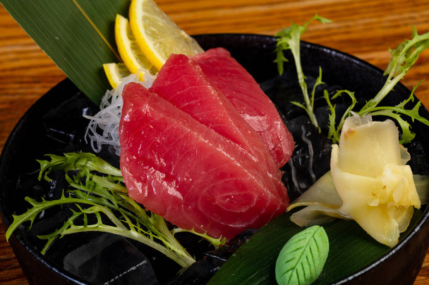 Cold tuna sashimi with lemon - Photo, Image
