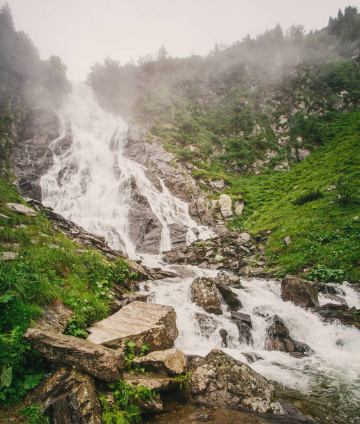 Summer landscape. Hiking Outdoor Concept. Rocky waterfall in the mountains. Balea waterfall - Fotó, kép