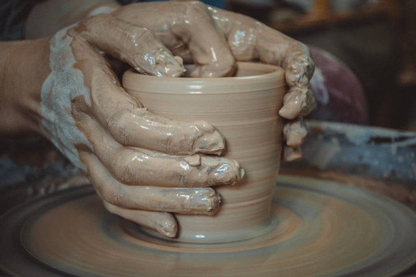 Creating ceramic products of white clay close-up. - Photo, Image