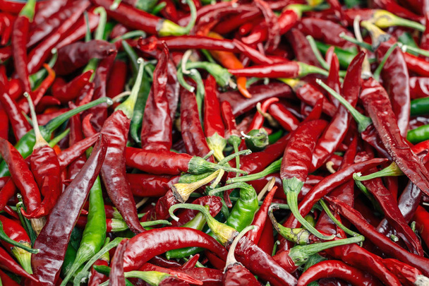 Close-up of a lot of hot chilli peppers. Selective Focus - Photo, Image