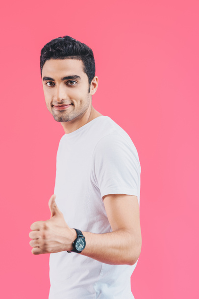 handsome smiling man showing thumb up isolated on pink - Zdjęcie, obraz