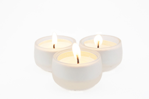 Burning candles on a white background - Photo, Image