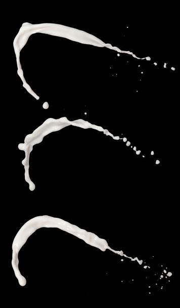 Milk splashes collection, isolated on black background - Foto, Imagem