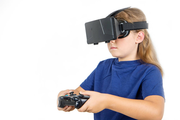 Happy woman with virtual reality headset and joystick playing vr games  - Valokuva, kuva