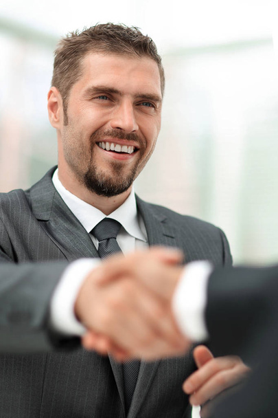 closeup .the Manager shakes hands with the client - Фото, зображення