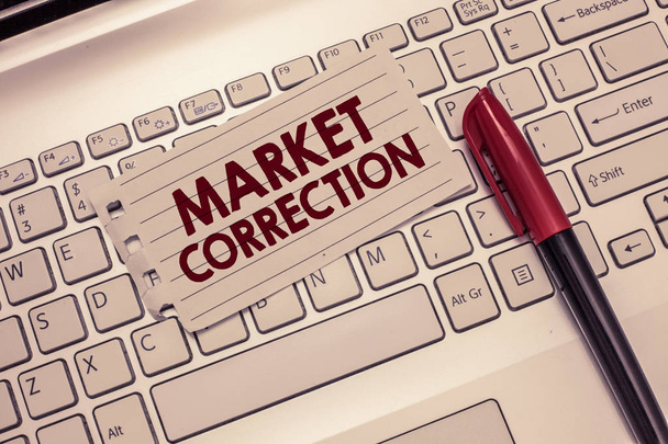 Conceptual hand writing showing Market Correction. Business photo showcasing When prices fall 10 percent from the 52 week high - Photo, Image