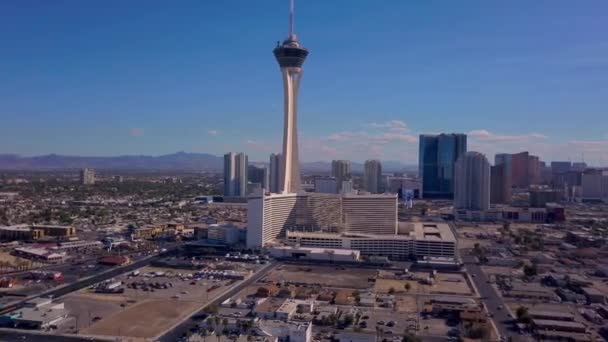 August 1, 2018 - Las Vegas, USA: Aerial view of Las Vegas city in Nevada, USA. View of the Stratosphere hotel and other popular buildings as well as highway and roads through the city. - 映像、動画