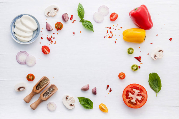 The ingredients for homemade pizza on white wooden background. - Photo, Image