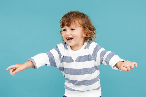 Portrait of happy joyful beautiful little boy, studio shot - Fotografie, Obrázek