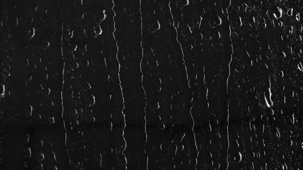 Corriente de gotas de agua en la ventana negra
 - Imágenes, Vídeo