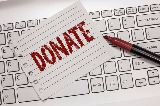 Sinal de texto mostrando Doar. Foto conceitual dar dinheiro ou bens para uma boa causa, por exemplo, a caridade ou as pessoas
 - Foto, Imagem