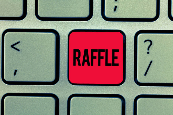 Text sign showing Raffle. Conceptual photo means of raising money by selling numbered tickets offer as prize - Photo, Image