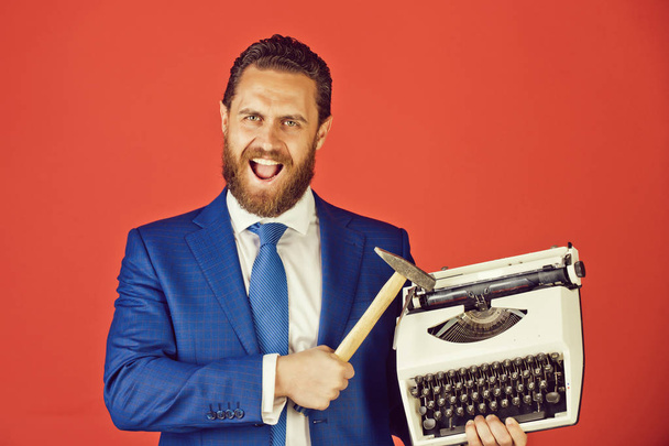 business man, aggressive businessman with typewriter and hammer - Φωτογραφία, εικόνα