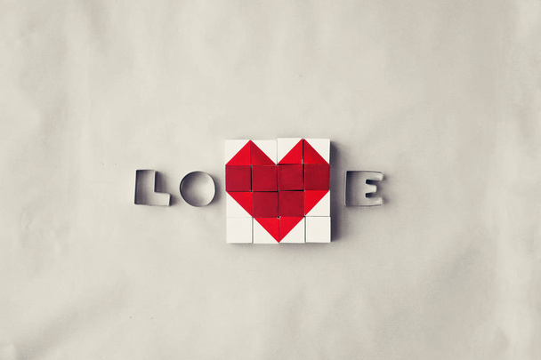 top view of blocks forming heart, valentines day concept background - 写真・画像