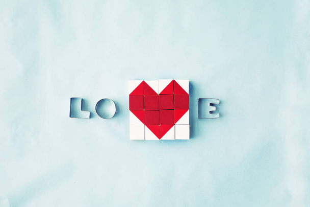 bovenaanzicht van blokken vormen hart, Valentijnsdag concept achtergrond - Foto, afbeelding