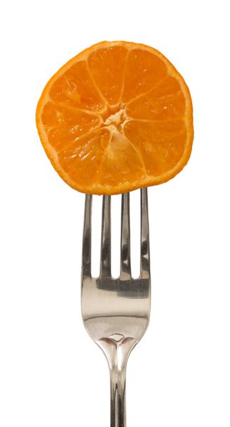 naranja en el tenedor, concepto de dieta
 - Foto, imagen