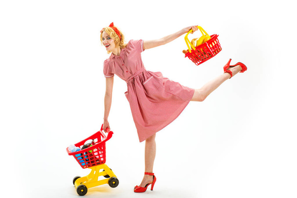 Young and carefree. Technologies make shopping easier. Full shopping. happy retro woman go shopping. Delighted woman shopping online. web shop and online payment for buying. happy woman with purchase. - Fotoğraf, Görsel