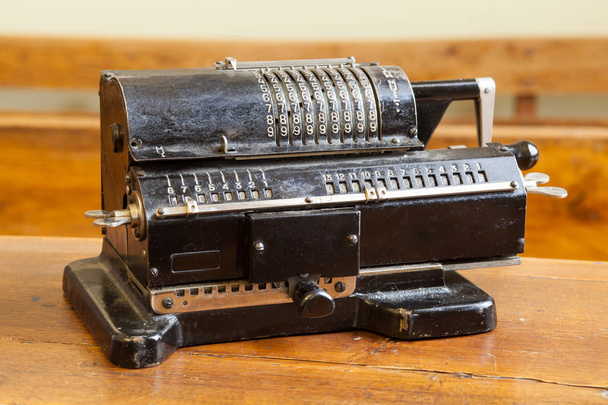 Old mechanical manual counting machine for mathematical calculations. Old soviet calculating machine - Photo, Image