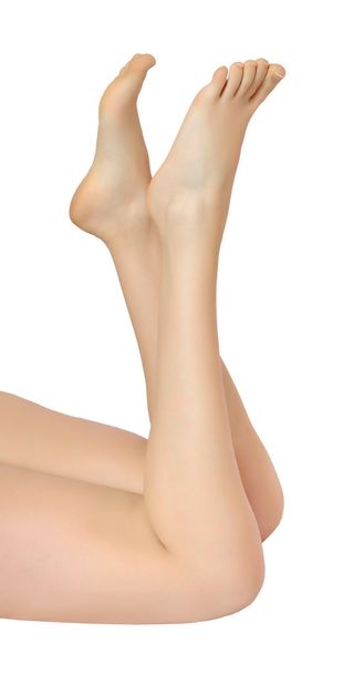 Beautiful woman legs isolated on white - Fotó, kép