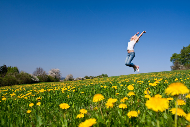 Happy young woman on meadow - Photo, Image