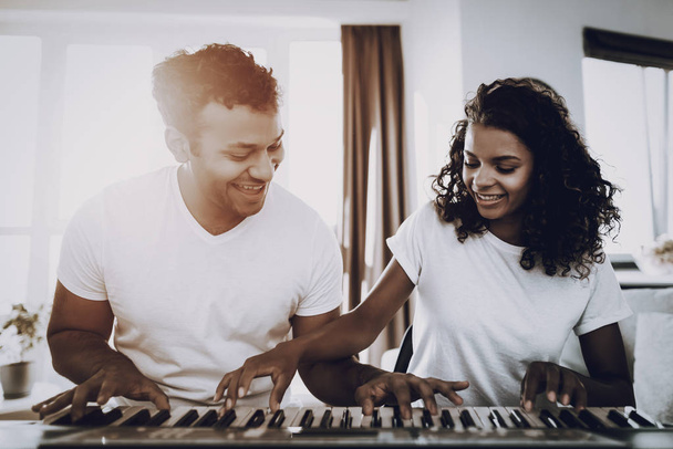 Afro American Couple Synthesizer Playing Concept. Happy Songwriter. Morning Leisure. Digital Format. Working Musician. Musical Hobby. Hands On Keyboard. Making Melody. Take A Rhytm. - Φωτογραφία, εικόνα