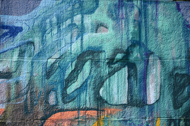 Фрагмент граффити рисунков. Старая стена декорирована краской в стиле уличного искусства. Многоцветная текстура фона
. - Фото, изображение