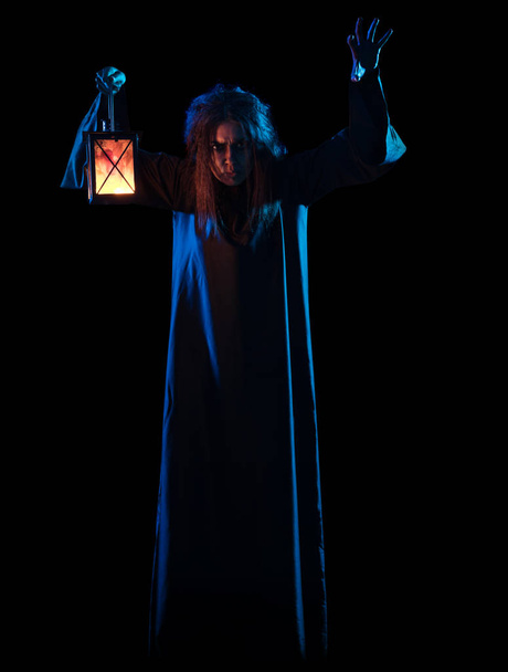 Scary witch isolated on black version - 写真・画像