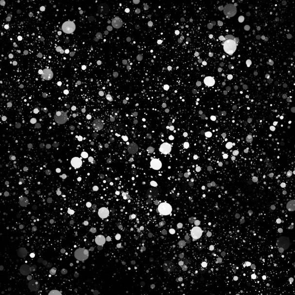 abstract wallpaper with falling snow on black background - 写真・画像