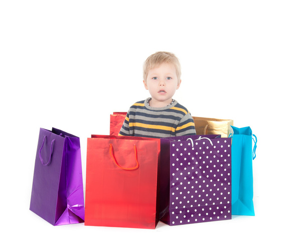 attractive boy with shopping bags - Фото, зображення