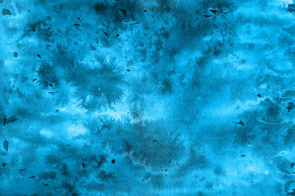 blaue Aquarellfarbe auf Papier abstrakten Hintergrund - Foto, Bild