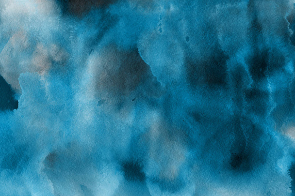 blue watercolor paint on paper abstract background - Foto, afbeelding
