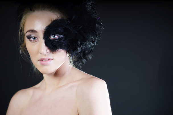 sexy woman with black feather half mask - Foto, Imagen