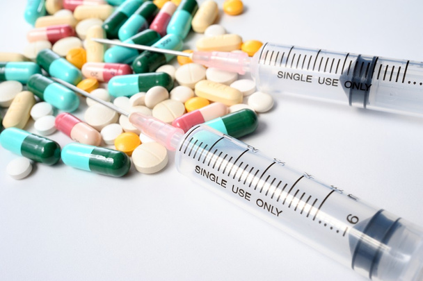 pills and syringe - Photo, image