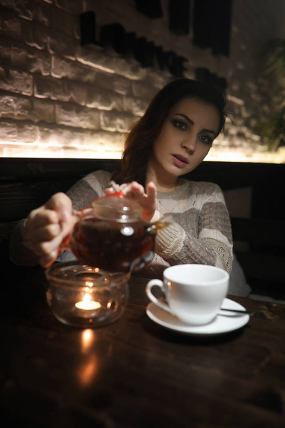 Beautiful girl in a cafe  - Valokuva, kuva