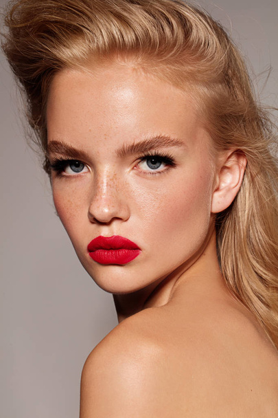 Red lips. Young model girl with beauty skin and blonde hair style. Perfect make up. - Fotoğraf, Görsel