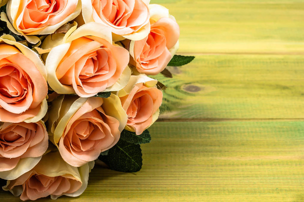 Roses bouquet as mothers day, background with flowers on wooden table - Foto, Imagem