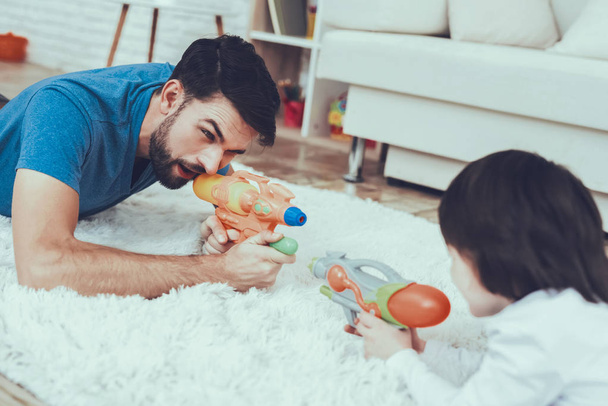 Home Time. Toys. Boy. Have Fun. Son. Plays Games. Happy Together. Smiling Kid. Father. Leisure Time. Man. Smile. Teddy Bear. Cars. Holidays. Spends Time. Have a Good Time. Happiness. - 写真・画像