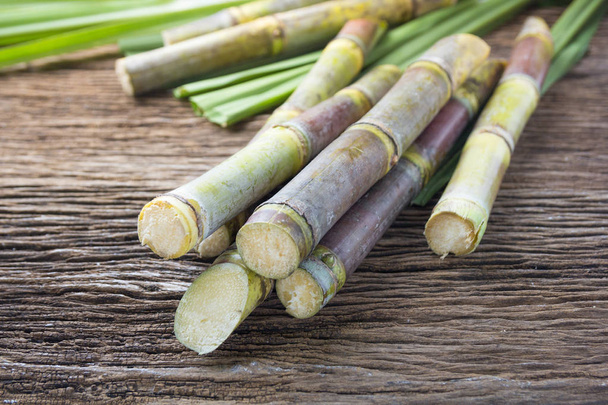 Close up sugarcane on wood background close up.	 - Valokuva, kuva