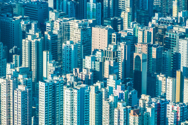 Belo edifício de arquitetura com padrão de hong kong pessoas residenciais na cidade
 - Foto, Imagem