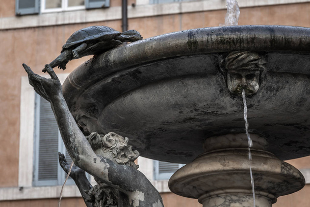 In the historic centre of Rome, in Piazza Mattei, the turtle fountain is one of the most beautiful in the City. Built in the late 1500s while the turtles are added in 1658 by Bernini. It's linket to a romantic legend. - Photo, Image
