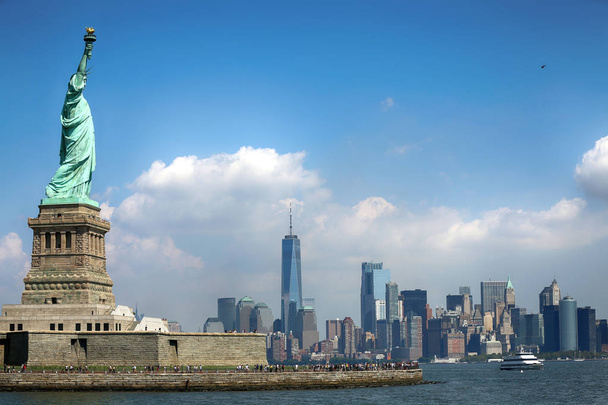 View of Panorama on Statue of Liberty and the Skyline of Manhattan, New York City, United States - Photo, Image