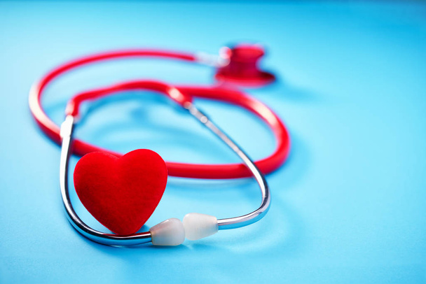 Heart and stethoscope on blue background.Medicine concept. - Photo, Image