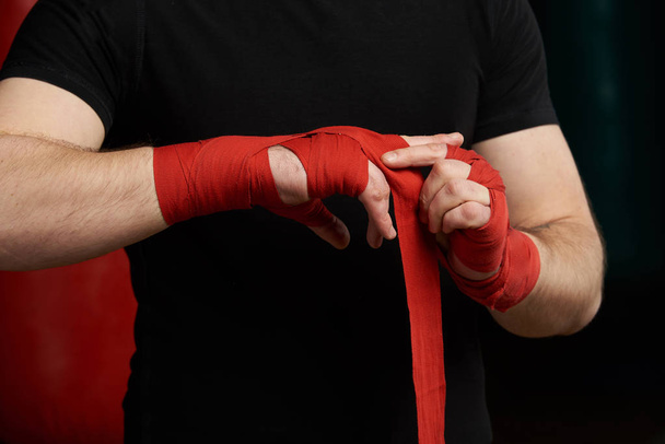 Close-up of applying boxing bandage - Photo, Image