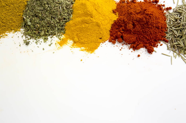 Mixed various spices on the white background - Foto, Imagen