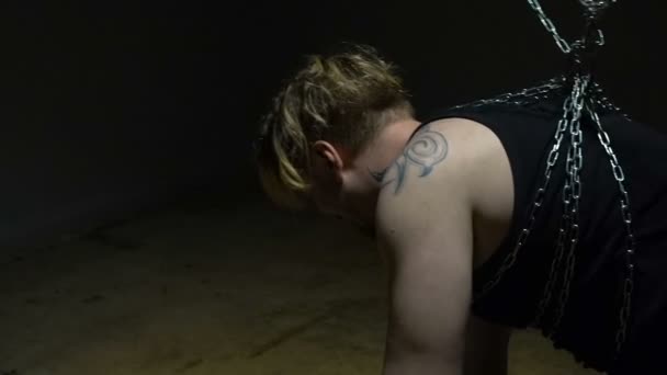 Addict bound in chains - Footage, Video