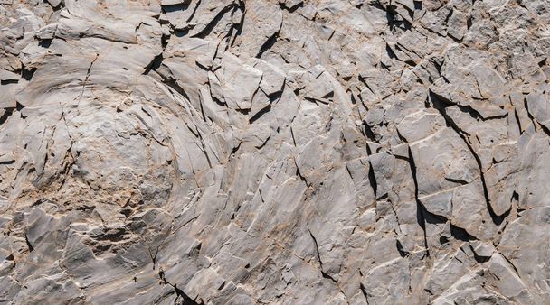 岩/岩の背景-玉ねぎの皮の風化と石のテクスチャ  - - 写真・画像