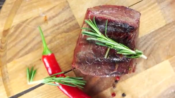 Sirloin steak with rosemary. - Footage, Video