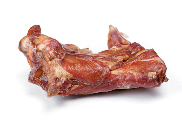 geräuchertes Schweinefleischstück isoliert auf weißem Hintergrund - Foto, Bild
